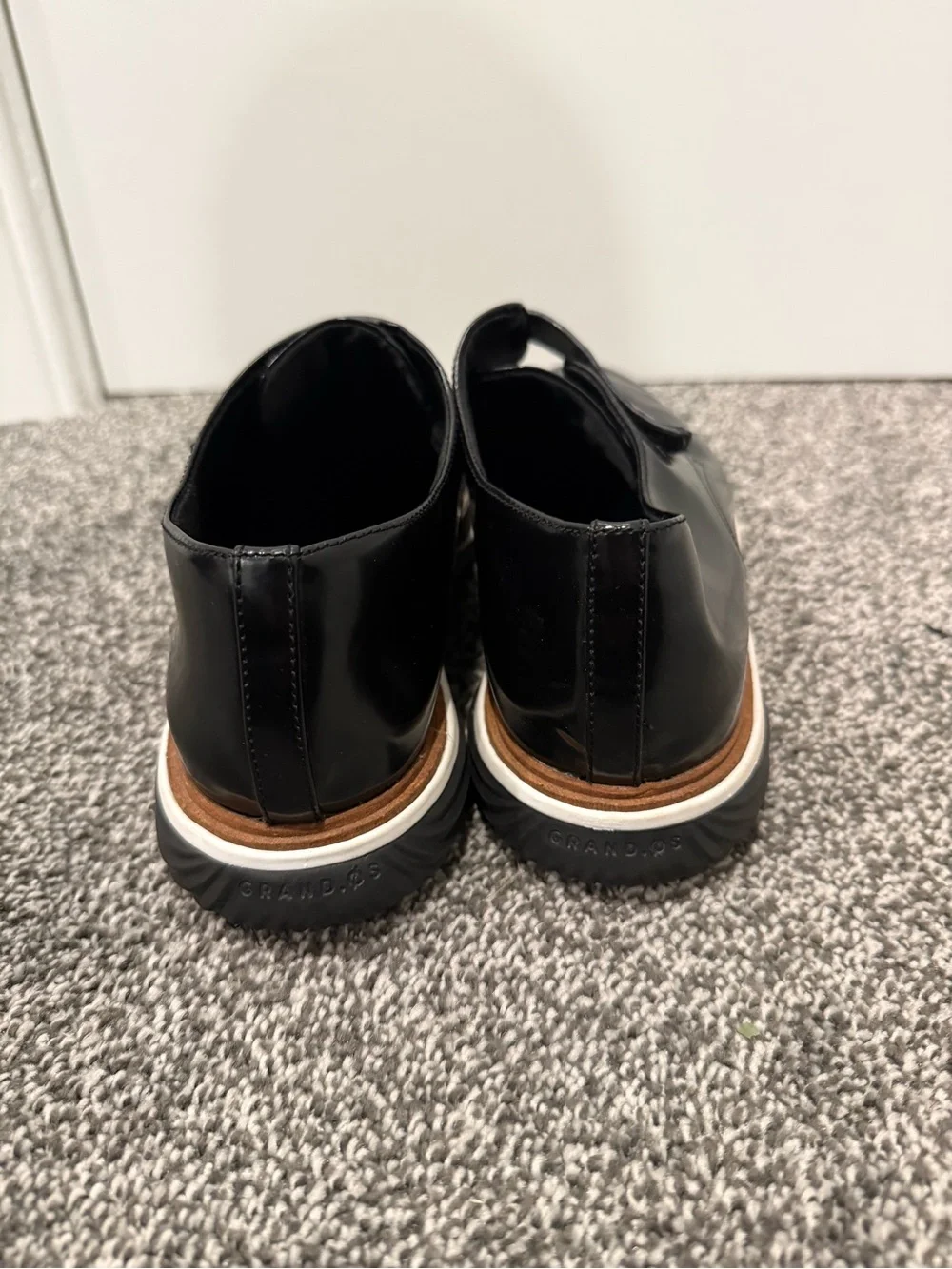 Cole Haan Black Monk Loafers in Black